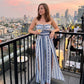 👗 New Arrival 56% OFF! 💥 Geometric Jumpsuit with Halter Neckline & Side Slit – Unique print & elastic back – Versatile, perfect for summer parties or resort wear ✨