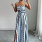 👗 New Arrival 56% OFF! 💥 Geometric Jumpsuit with Halter Neckline & Side Slit – Unique print & elastic back – Versatile, perfect for summer parties or resort wear ✨