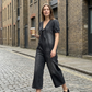 ☀️New Arrival 50% OFF🌊Effortless Summer Chic – Loose Fit V Neck Tie Front Wide Leg Romper for Women🌴